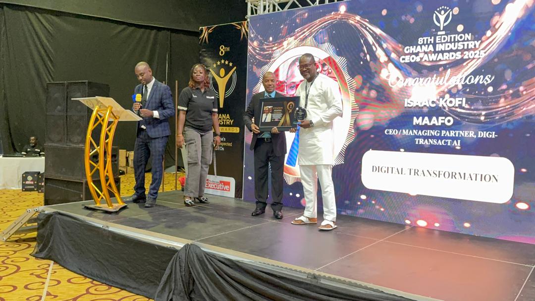 Isaac receiving the award at the ceremony